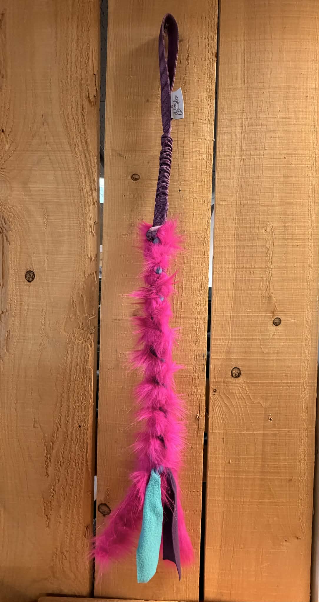 Jouet à tirer avec bungee (tug)