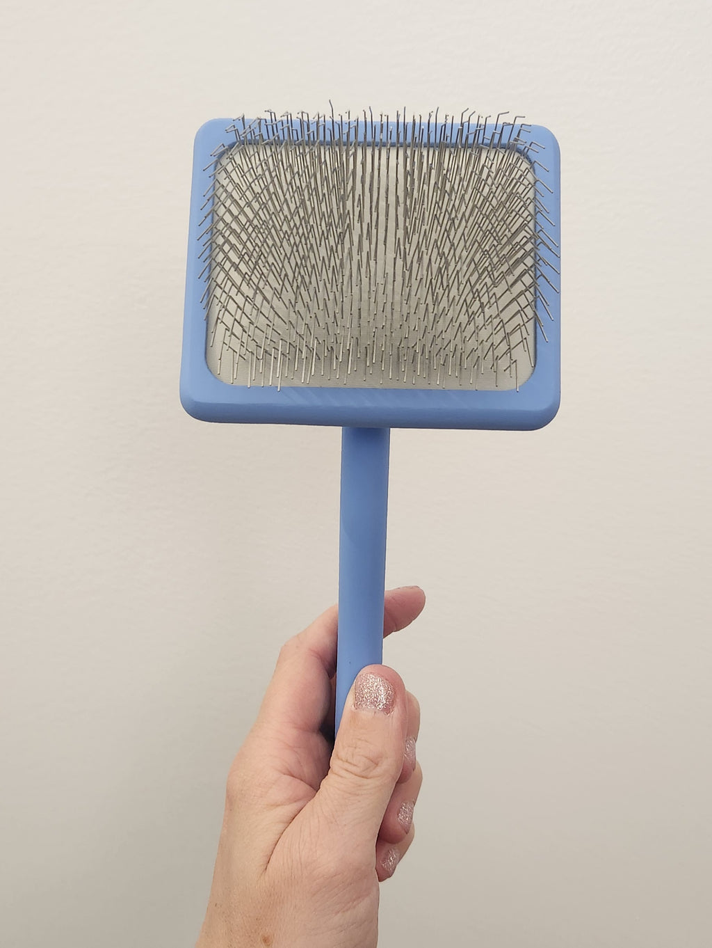 Brosse ferme pour chiens et chats Slicker