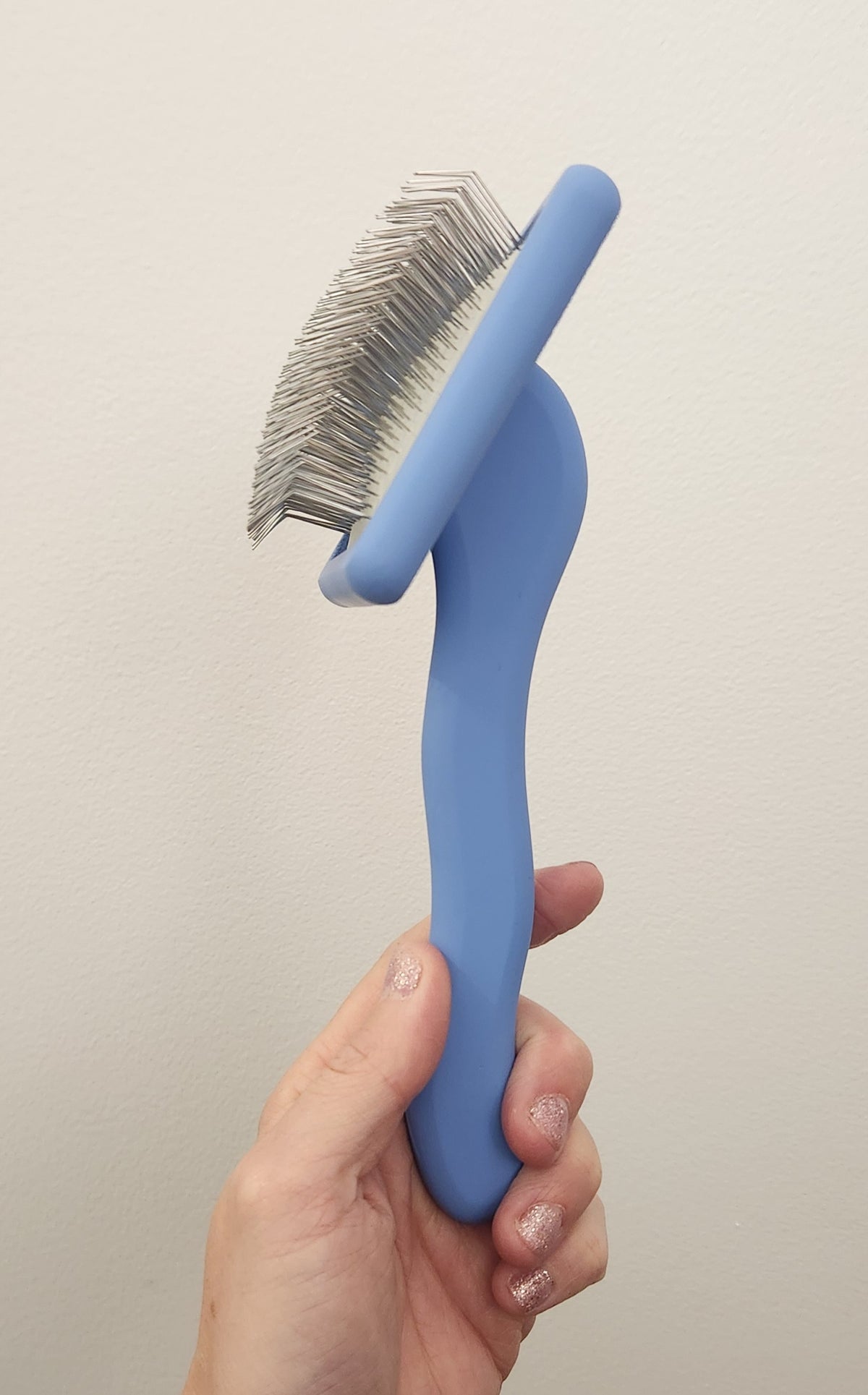 Brosse ferme pour chiens et chats Slicker